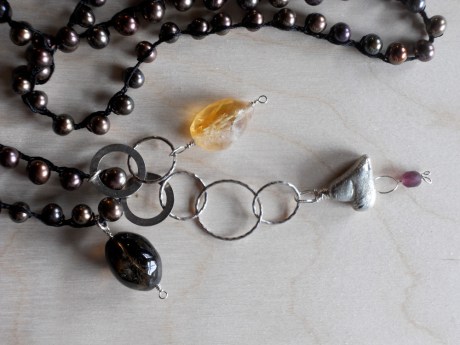 I love the hearts GJ cast a few years ago in lead-free pewter. I wear one just on a simple cord.