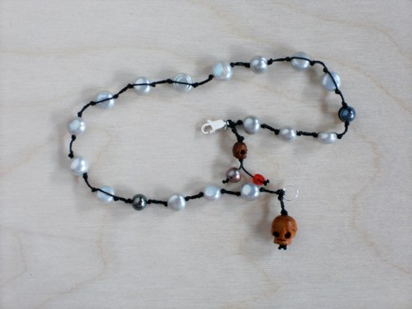 Piratey anklet of silvery pearls and wooden skulls. Firehorse Designs, Victoria BC.