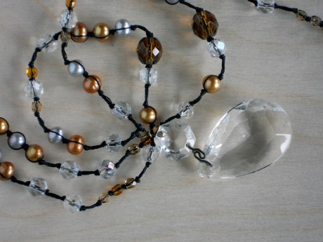 Clear chandelier crystal, detail. © Firehorse Designs