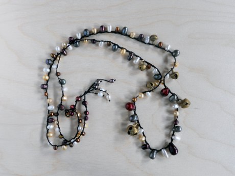 Gorgeous teardrop pearls and brass bells necklace. Firehorse Designs, Victoria BC.