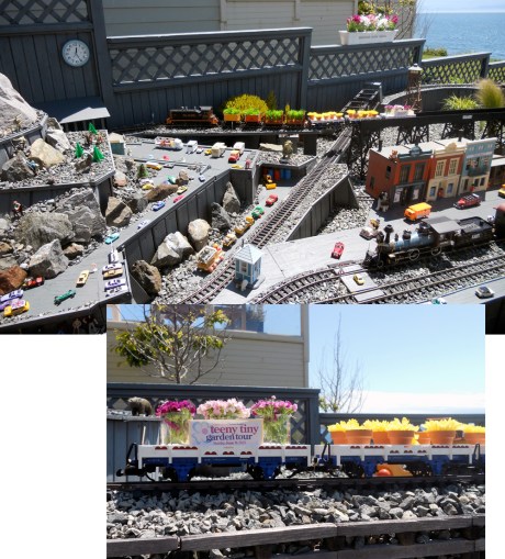 Such fun! An outdoor train set, all decorated for the Garden Tour.