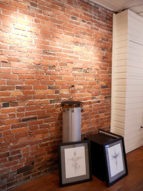 The walls are bare and ready to showcase the work of other artists.