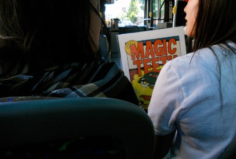 Our friend Gareth Gaudin's spot was too busy to photograph when we went by, but later, when we were taking the bus to a friend's, we saw a young woman with one of his prints; she was very excited about it.