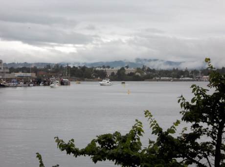 Looking out toward the entrance to the Inner Harbour with the clouds hanging out over the hills of Sooke and Metchosin beyond.
