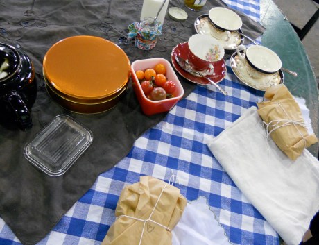 My little picnic: sandwiches, fresh farm cherry tomatoes, pickles made by our friend Rebecca, and in the tin, orange coconut macaroons. And of course, tea, this year supplied by Murchies.