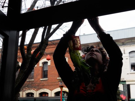 Shops and homes along the lion dance route hang lettuce and red packets with money enclosed. Accompanied by drummers, the lion visits each doorway and accepts the packet and lettuce. Firecrackers scare away evil spirits and leave be behind good luck and good fortune for the year ahead.