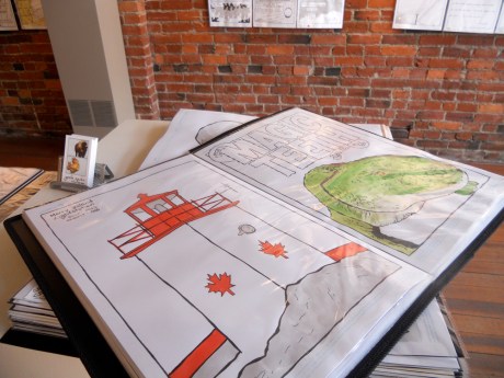 Besides all 100+ pieces on the walls, there are two large binders full of originals and prints.