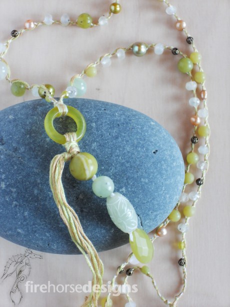 Various jades and pearls in shades of green.