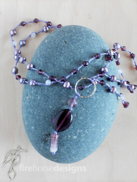 Pearls, glass and silver.