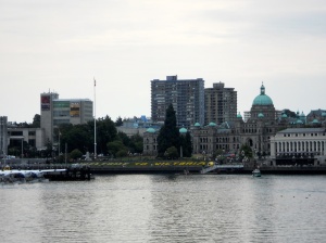 A view of the Inner Harbour from a different direction. The Welcome to Victoria sign built from yellow flowers is quite visible even from this distance.