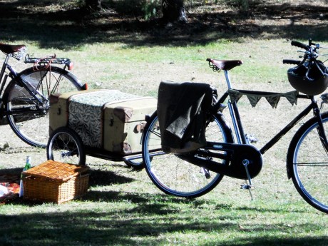 Beautiful bicycles, picnic hampers and trailers.
