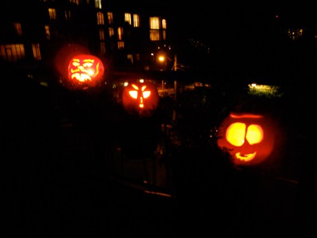 Billy cut the bottoms off the pumpkins instead of the tops so he could put them over his patio lights.