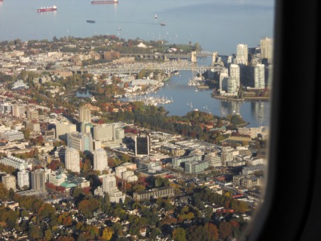 Beautiful English Bay and False Creek with the Granville Street and Burrard Street bridges, Vanier Park on the top left, and the West End on the top right. A perfect view of Vancouver.